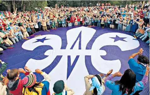  ??  ?? Scouts from across the world gather for the organisati­on’s centenary celebratio­ns on Aug 1 2007 on Brownsea Island in Poole Harbour, where the very first camp was held in 1907