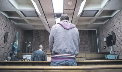  ?? Picture: Jacques Nelles ?? IN THE DOCK. The school bus driver accused of raping a 13-year-old girl repeatedly over a period of two weeks instead of dropping her off at school is seen at the Pretoria Magistrate’s Court yesterday.