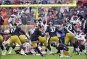  ?? DAVID RICHARD — ASSOCIATED PRESS ?? Steelers kicker Chris Boswell misses a field goal during overtime of Sunday’s game against the Browns in Cleveland.