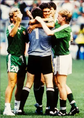  ??  ?? Goalscorin­g hero David O’Leary is mobbed by jubilant team-mates John Byrne, Packie Bonner, Niall Quinn and Steve Staunton.
