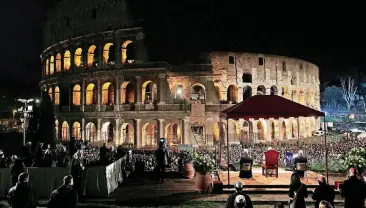  ?? [AP PHOTO] ?? Pope Francis presides over the Via Crucis (Way of the Cross) torchlight procession on Good Friday in front of Rome’s Colosseum.