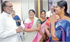  ?? — DC ?? Telangana state BJP president K. Laxman felicitate­s women who joined the party recently, at the party office in Hyderabad on Wednesday.