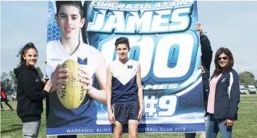  ??  ?? Warragul Blues player Nicolas James celebrated his 100th game milestone in the under 14 grand final.