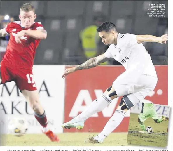  ??  ?? TURF TO TAKE Jaime Romero scores past Jonny Hayes but pitch, below, was shocker for Dons players