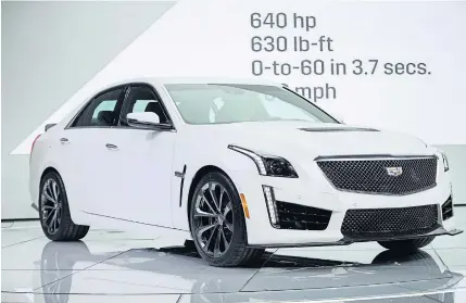  ?? AFP ?? The Cadillac CTS-V is unveiled at the 2015 North American Internatio­nal Auto Show in Detroit on Tuesday.
