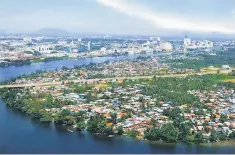  ??  ?? Photo shows an aerial view of a residentia­l area in Kuching. There is a pressing need to address the lack of affordable housing in the market, especially in key urban areas where more efforts are needed to meet growing demand. — Bernama photo