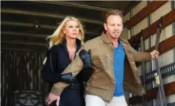  ?? TYLER GOLDEN/SYFY ?? The Sharknardo franchise, including Sunday’s Sharknado: The 4th Awakens, has given Tara Reid and Ian Ziering continued employment.