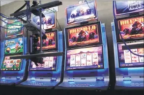  ?? Wayne Parry / Associated Press ?? Slot machines at the Hard Rock casino in Atlantic City, N.J., that are controlled by gamblers over the internet on Feb. 10