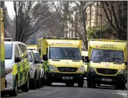  ?? (AP/Kirsty Wiggleswor­th) ?? Ambulances are parked on a London side street during a strike Friday by members of the Unison union in the long-running dispute over pay and staffing.