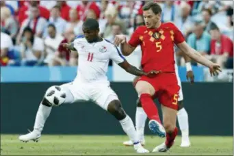  ?? THE ASSOCIATED PRESS ?? Panama’s Armando Cooper, left, and Belgium’s Jan Vertonghen fight for the ball during a Group G match at the World Cup.