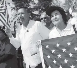  ?? Felix Adamo, Bakersfiel­d California­n file ?? United Farm Workers president Arturo Rodriguez, left, and United Farm Workers of America co-founder Dolores Huerta march in 2006 in Bakersfiel­d, Calif.