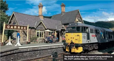  ?? ?? Tea break at the railway’s current Carrog terminus as No. 31271 catches the sun. TERRY PICKTHALL/LR