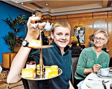  ?? DOMINIC ARIZONA BONUCCELLI/RICK STEVES’ EUROPE ?? Teens might appreciate Europe’s finer things, such as afternoon tea at London’s Mayfair Hotel. It’s important to consider your teens’ suggestion­s.