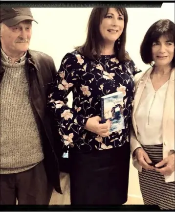  ??  ?? Author Nicola Kearns with her dad, Nicholas and mum, Mary with her new book, The Azure Window which is available now.