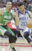  ?? AP PHOTO ?? OFF TO A GOOD START: Jayson Tatum defends against the 76ers’ Timothe Luwawu-Cabarrot during the Celtics’ summerleag­ue victory last night in Salt Lake City.