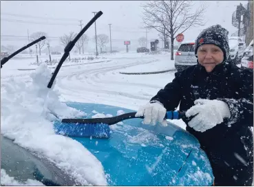  ?? MACOMB DAILY FILE PHOTO ?? Friday’s snowstorm arrived early and has created hazardous conditions for motorists.