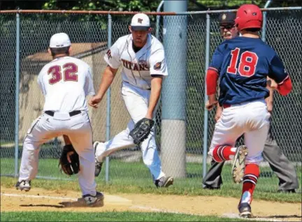  ?? DEBBY HIGH — FOR DIGITAL FIRST MEDIA ?? HT’s 1st baseman Billy Collins and pitcher Jon Udzinski tagged first base before Plumstead’s Blake Doherty made it to the plate during their game at home Sunday.