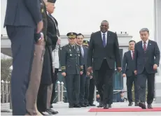  ?? — AFP photo ?? Austin (centre) and Lee attending a ceremonial welcome at the Defence Ministry in Seoul.