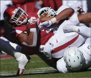  ?? NWA Democrat-Gazette/J.T. WAMPLER ?? Running back Rakeem Boyd (5) and the Razorbacks’ offense will have a tough task Saturday when they play at No. 21 Mississipp­i State. The Bulldogs are ranked No. 7 in total defense in the NCAA.