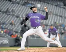  ?? Andy Cross, The Denver Post ?? Rockies pitcher Austin Gomber gave up just two runs on two hits in six innings against the Houston Astros on Wednesday.