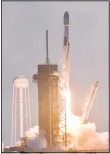  ?? (AP) ?? A SpaceX Falcon 9 rocket lifts off from Pad 39A at Kennedy Space Center, in Fla., Tuesday, Oct. 6. The rocket is carrying Starlink communicat­ions satellites.