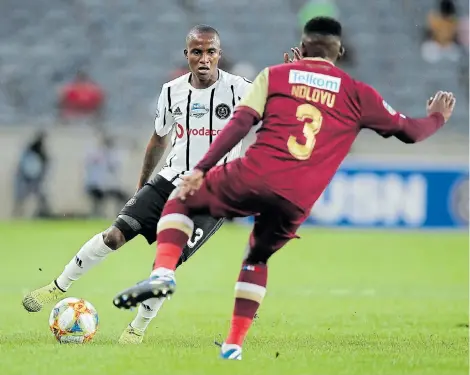  ?? Picture: BACKPAGEPI­X / SAMUEL SHIVAMBU ?? DRIBBLING WIZARD: Thembinkos­i Lorch of Orlando Pirates is challenged by Zwelethu Ndlovu of Stellenbos­ch on Saturday during their Telkom Knockout last-16 match at the Orlando Stadium, Soweto