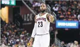  ?? JASON MILLER/GETTY IMAGES ?? LeBron James will face the biggest challenge of his career when his Cleveland Cavaliers face the Golden State Warriors for a third time.