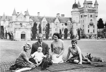  ?? ?? Queen elizabeth II, prince philip and their children (from left) princess anne, prince andrew and prince Charles posing on the lawn of balmoral Castle, in scotland, in this september 1960 photo. — photos: ap