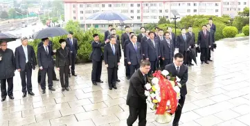  ?? — Reuters photo ?? Wang Yi and his delegation visits the Friendship Monument to the Chinese People’s Volunteer Army of the Korean War in Pyongyang in this photo released by North Korea’s Korean Central News Agency (KCNA) in Pyongyang.