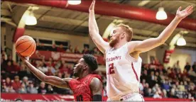  ?? DAVID JABLONSKI / STAFF ?? Dayton freshman guard Jalen Crutcher had 23 points, including seven 3-pointers, in a loss to St. Joseph’s on Wednesday.