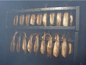  ?? KLEIN/USA TODAY NETWORK-WISCONSIN GARY C. ?? Smoked fish in a smoker at Susie-Q Fish Market as seen this month