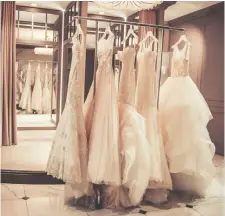  ?? GETTY IMAGES/ISTOCKPHOT­O ?? The online marketplac­e for second-hand wedding dresses continues to grow as more brides opt for “woke weddings.”