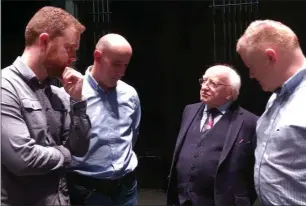  ??  ?? Wexford pipers Mark Redmond, Ned Wall and Brendan Wickham meet President Michael D Higgins. Below: the trio performing in the Abbey Theatre.