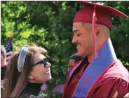  ?? ?? Goodrich Academy Class of 2022 graduate Mathews Cardeal and his mother Lusiene Oliveria, who were all smiles at the special graduation ceremonyon Monday ahead of him shipping off to the Marines two days before the Fitchburg school’s graduation ceremony.