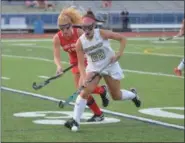  ?? THOMAS NASH - DIGITAL FIRST MEDIA ?? Spring-Ford’s Lauren Constantin­e (29) closes in on the ball while Owen J. Roberts’ Eloise Gebert (17) defends during Tuesday’s game.