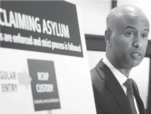  ?? PAUL CHIASSON / THE CANADIAN PRESS FILES ?? Minister of Immigratio­n Ahmed Hussen travelled to the African nation of Nigeria this week as part of the Liberal government’s efforts to stop asylum seekers from crossing into Canada from the United States between legal checkpoint­s.
