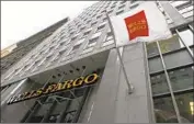  ?? Justin Sullivan Getty Images ?? WELLS FARGO is still coping with fallout from its various scandals, including a bevy of suits and probes.