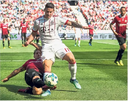  ?? — AFP ?? Gaining momentum: James Rodriguez (centre) had an impressive first season with Real Madrid in the wake of a starring role for Colombia at the 2014 World Cup in Brazil.