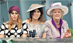  ??  ?? Jeanie, Countess of Carnarvon, at the 2013 Derby with Princess Beatrice, left, and Princess Eugenie. The Countess was a close friend of the Queen