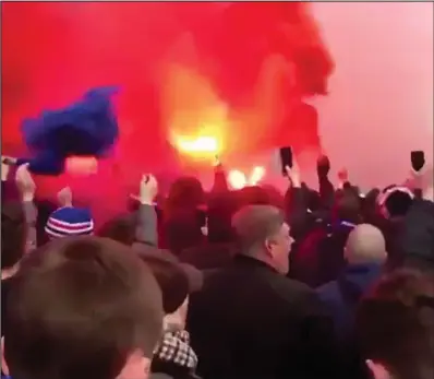 ??  ?? Rangers fans march yesterday before the Old Firm match at Ibrox Stadium Picture: The Away Fans video via Twitter