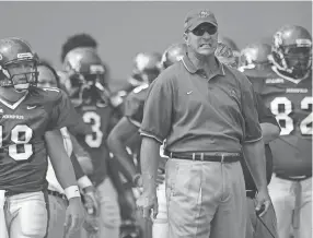  ?? COMMERCIAL APPEAL FILE ?? Sept. 27, 2003 University of Memphis Coach Tommy West reacts to a score by Arkansas during the Tiger's game Saturday at the Liberty Bowl.