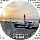  ??  ?? A romantic meal on the beach