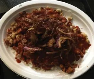  ?? ALANA HUDSON, SPECIAL TO THE HAMILTON SPECTATOR ?? Koshari, Egypt’s national dish, was comforting and filling.