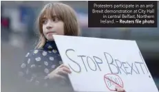  ?? — Reuters file photo ?? Protesters participat­e in an antibrexit demonstrat­ion at City Hall in central Belfast, Northern Ireland.