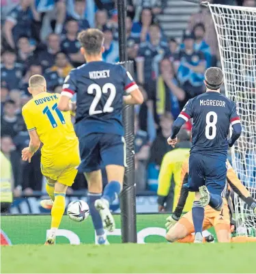  ?? ?? Artem Dovbyk scores Ukraine’s third goal with the final touch of the game.