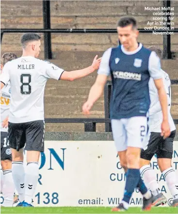  ??  ?? Michael Moffat celebrates scoring for Ayr in the win over Dundee in November.