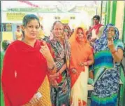  ?? PTI ?? People show their inkmarked fingers after casting their vote for the Ater assembly bypoll in Madhya Pradesh on Sunday.