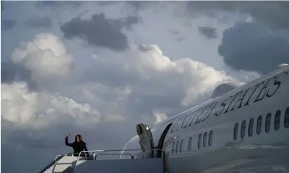  ?? Photograph: Drew Angerer/AFP/Getty Images ?? Vice-President Kamala Harris waves as she boards Air Force Two at Fort Lauderdale-Hollywood internatio­nal airport in Florida, on 23 March.