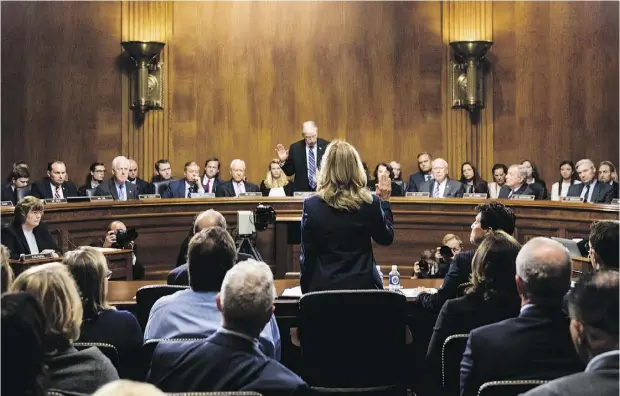  ?? TOM WILLIAMS / POOL PHOTO VIA AP ?? Christine Blasey Ford is sworn in by Senate Judiciary Committee chairman Chuck Grassley on Capitol Hill in Washington, D.C., on Thursday.