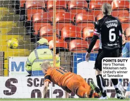  ??  ?? POINTS DUTY Hero Thomas Mikkelsen nets United’s winner at Tannadice